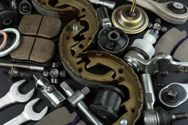istock Various Car parts on dark background 1129311557