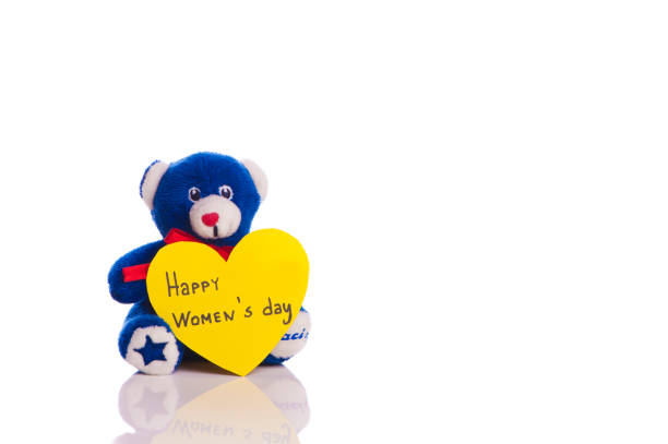 Teddy with heart on a white background  - happy women's day