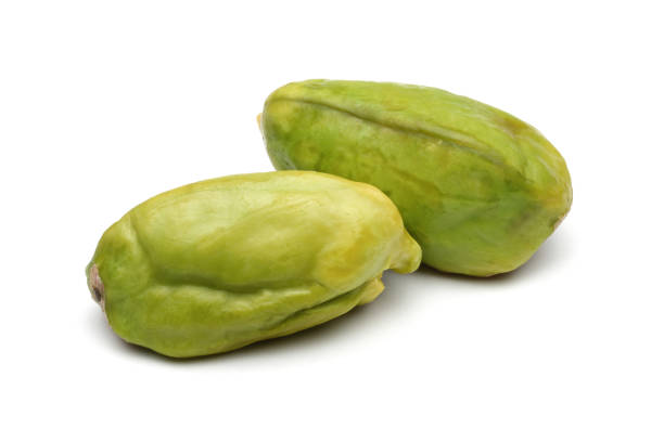 istock Fresh pistachio nuts isolated on white 1129313284