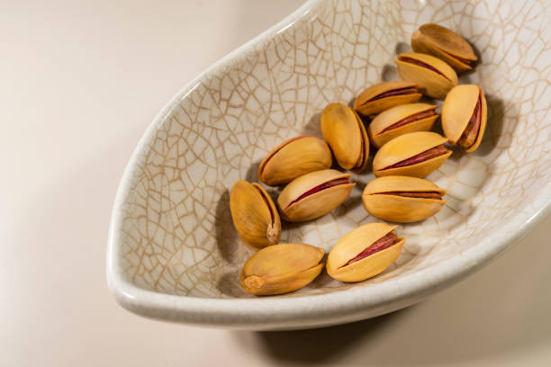 Close up pistachios nuts.Pistachios are nuts that offer numerous health benefits