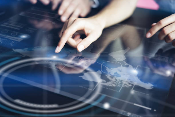 istock Working on progect with futuristic digital tablet 1129315418