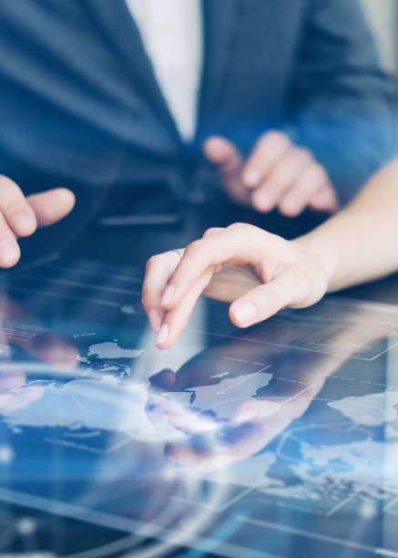 istock Working on progect with futuristic digital tablet 1129315419