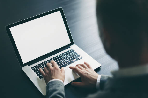 istock Man with laptop. Mockup of the screen 1129315470