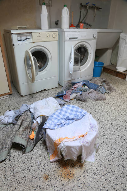 istock Two old used washing machines and many rags 1129315497