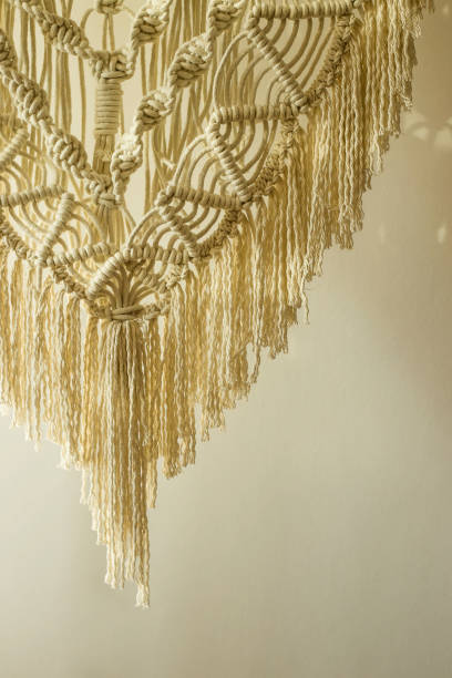 istock Weaving macrame modern needlework in the style of minimalism 1129315803
