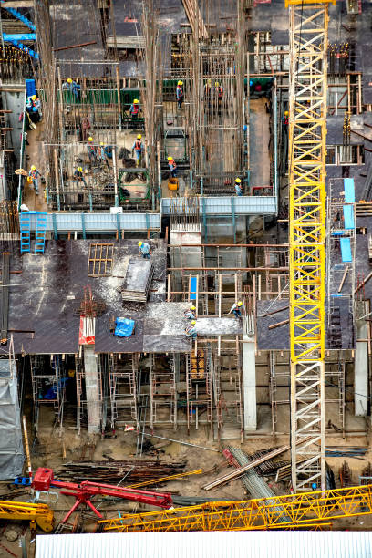 istock Aerial view of a building construction in progress 1129317000