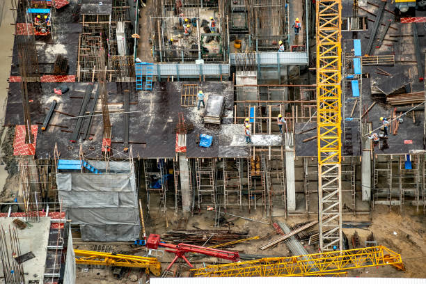 istock Aerial view of a building construction in progress 1129317010