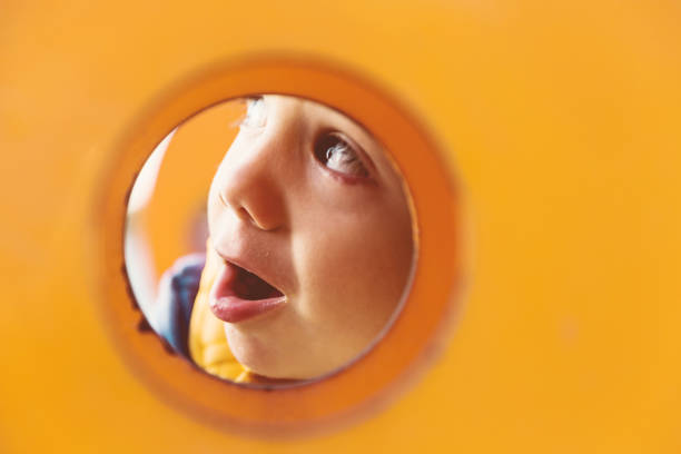 istock Little Boy Playing in the Playground 1129321444