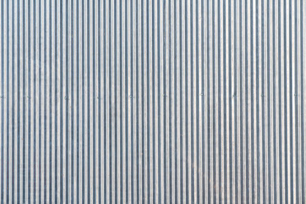 Seamless gray color wallcovering in random stripe line pattern / background concept / texture