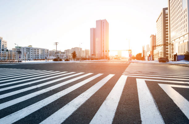 istock Zebra crossing and modern buildings in winter 1129323748