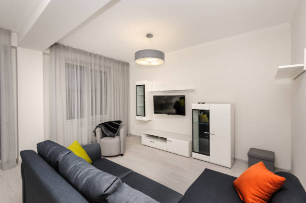 istock Modern white and gray living room interior 1129323996