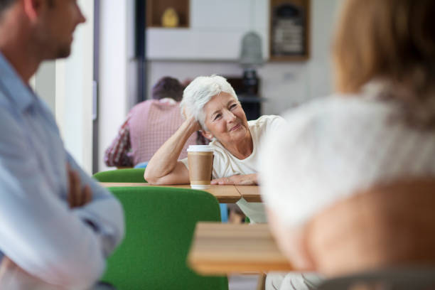 istock Senior woman in caffee shop 1129324787