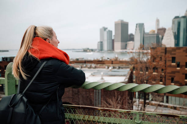 istock Woman Sightseeing in New York 1129327444