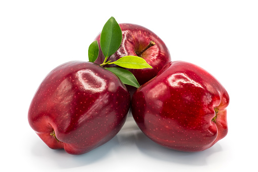 Red apples on white background