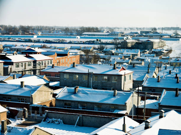 istock Roofs covering with snow at winter 1129329206