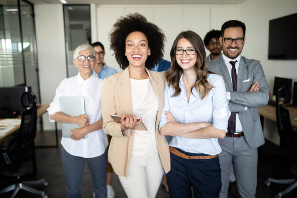 istock Successful business group of people at work in office 1129331138