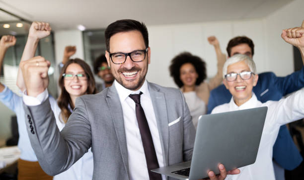 istock Successful business group of people at work in office 1129331147