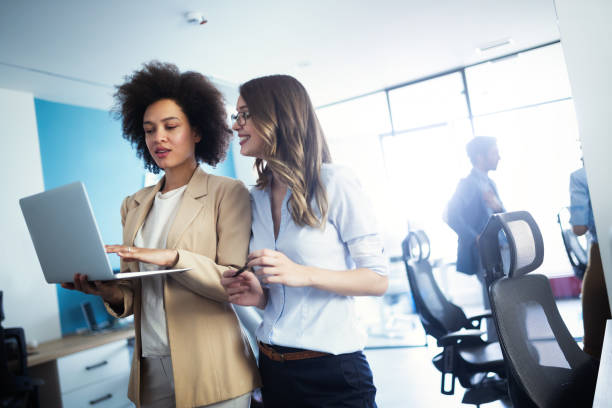 istock Successful business group of people at work in office 1129331208