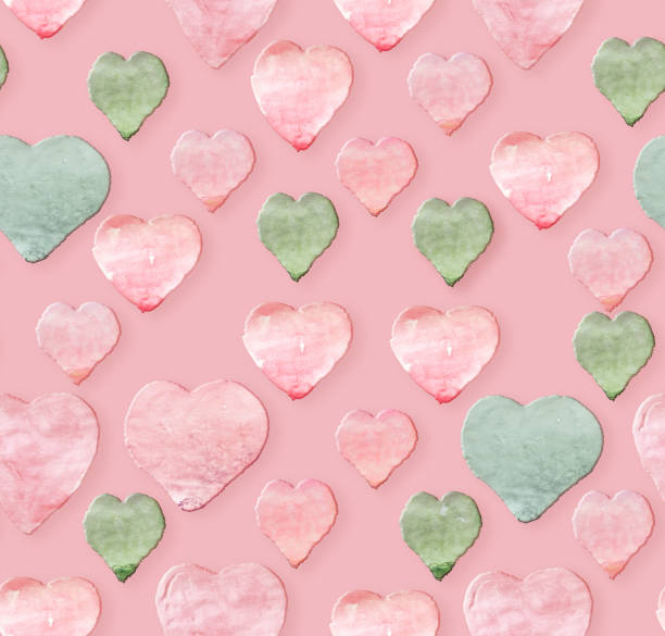 istock Watercolor hearts on white background. Pink Seamless pattern for wedding card,  fabric, clothes 1129331640