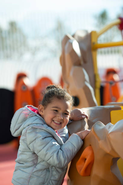 istock Toddler playing at playground. 1129333255