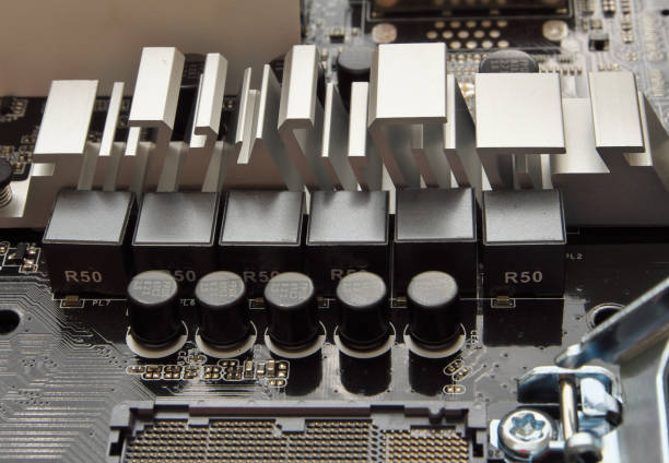 istock capacitors, resistors,cooling radiator and other electronic components mounted on motherboard 1129333397