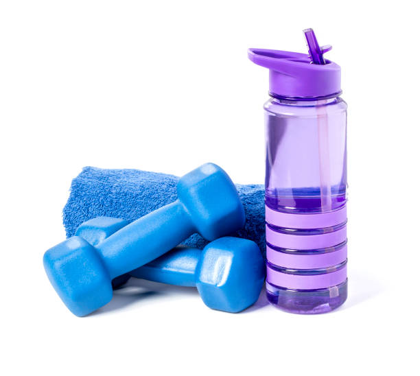 istock fitness dumbbells and water isolated 1129336218
