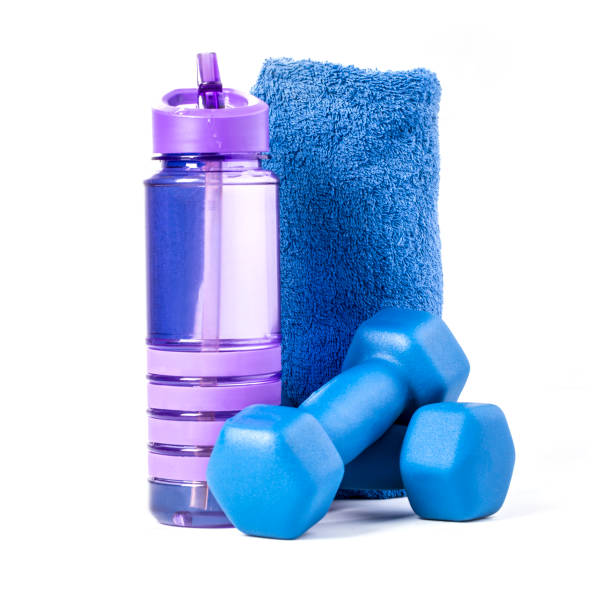 istock fitness dumbbells and water isolated 1129336225