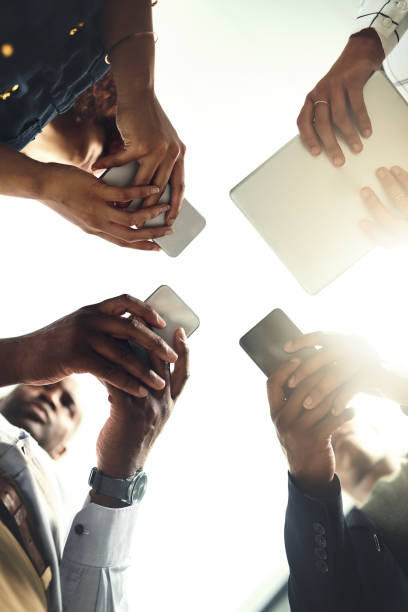istock Sharing and storing business updates through the cloud 1129339365