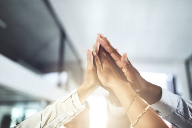 istock Collaborating to bring success to our team's name 1129339576