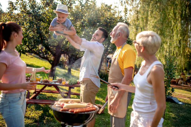 istock Family having a barbecue party 1129340612