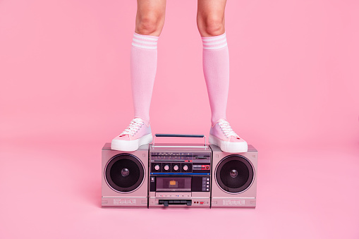 Cropped close up photo skinny perfect ideal she her lady legs standing on boom box play fitness coach happy glad see new members of fit life team soundtrack turned on isolated pink rose background