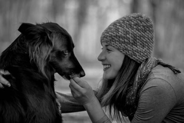 Woman with dog in the forest