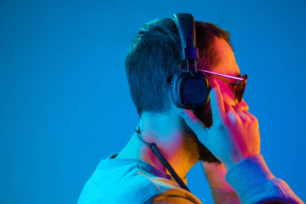 istock Enjoying his favorite music. 1129342292