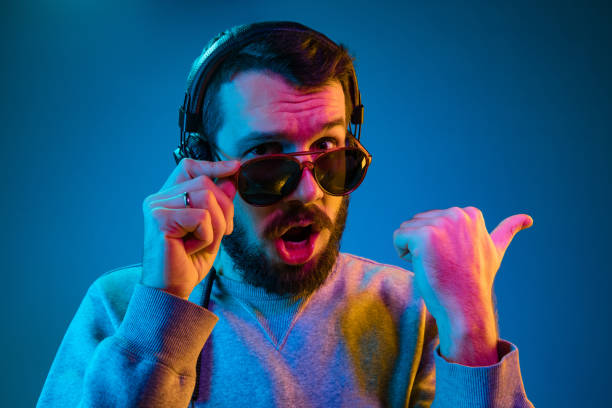 istock Enjoying his favorite music. 1129342317