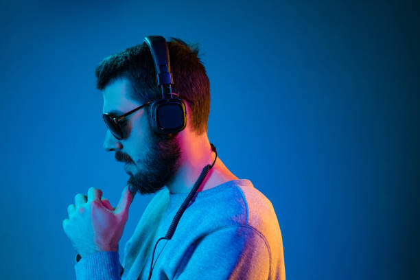 istock Enjoying his favorite music. 1129342320