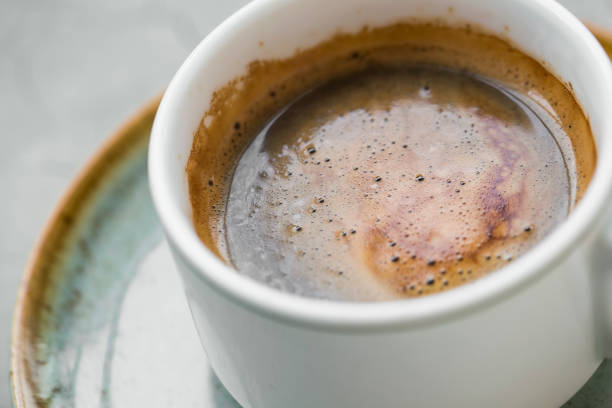 istock Espresso coffee cup. Fresh italian espresso coffee closeup 1129343336