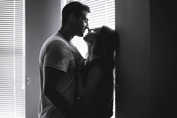 istock Kissing couple 1129344760