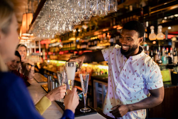 istock Bartender Pouring a Glass of Prosecco 1129345308