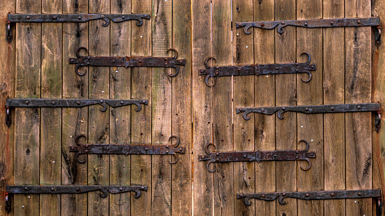 wooden gate with wrought iron elements, wood texture