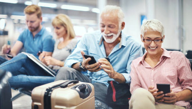istock Using the phone makes the waiting for transportation feel much shorter. 1129346673
