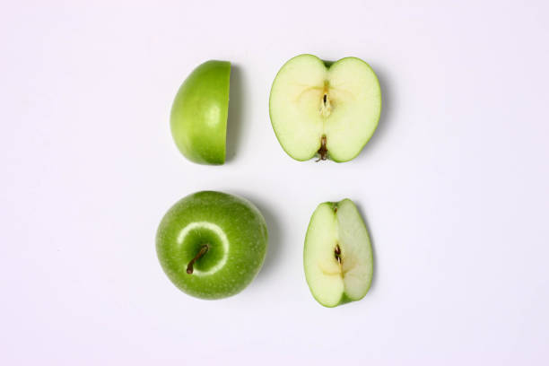 apple in white background apple slice, white, healthy, vegetarian, organic taklit stock pictures, royalty-free photos & images