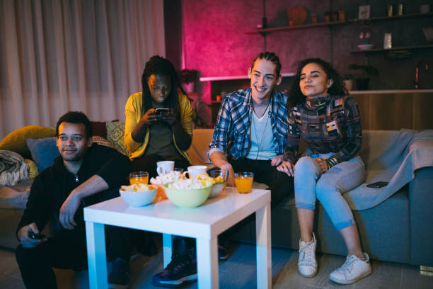 istock Casual night with friends at home 1129348381