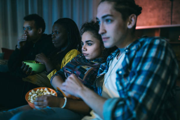 Friends watching horror movie