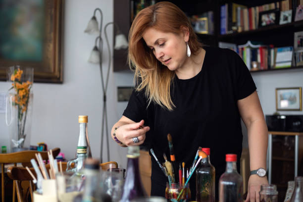 istock Art painting on a glass bottle 1129354269