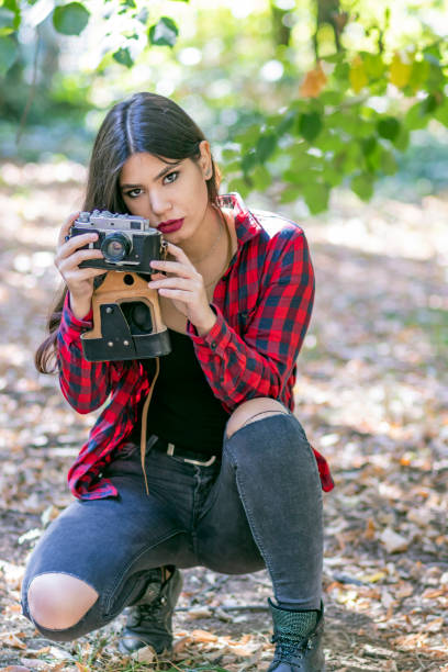 istock Woman Photographer in Nature 1129358671