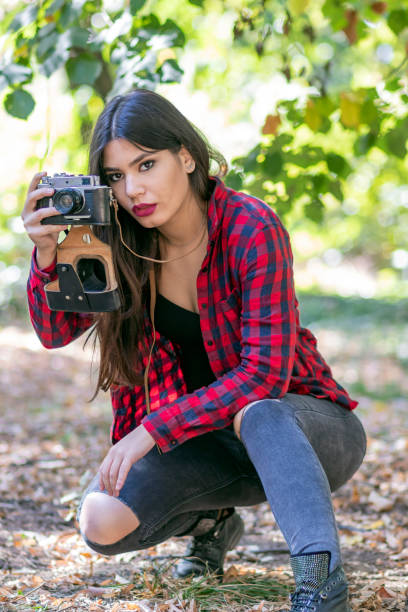 istock Woman Photographer in Nature 1129358737