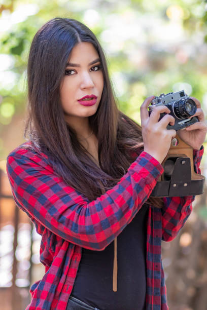 istock Woman Photographer in Nature 1129358833