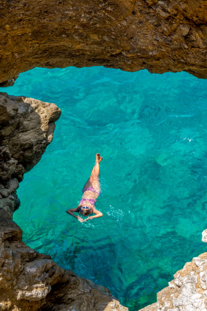 istock Women enjoying swimming. 1129359225