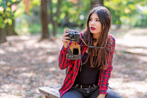istock Woman Photographer in Nature 1129359436