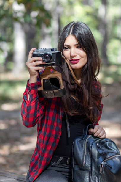 istock Woman Photographer in Nature 1129360258